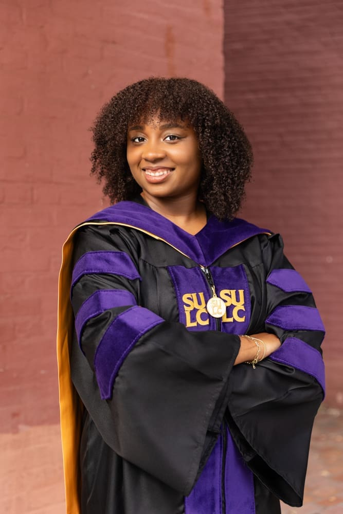 graduation photo of grad student becoming a lawyer