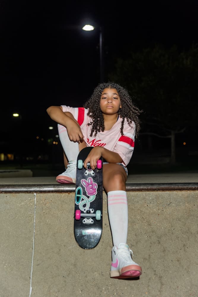 Tween girl celebrating her birthday with a skate boarding themed session