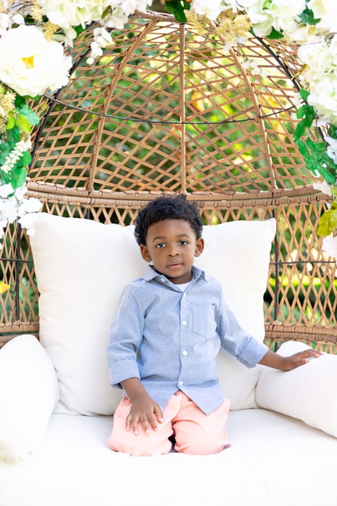 happy boy smiling in Baton Rouge taking his pictures with Children's Photographer Shenica